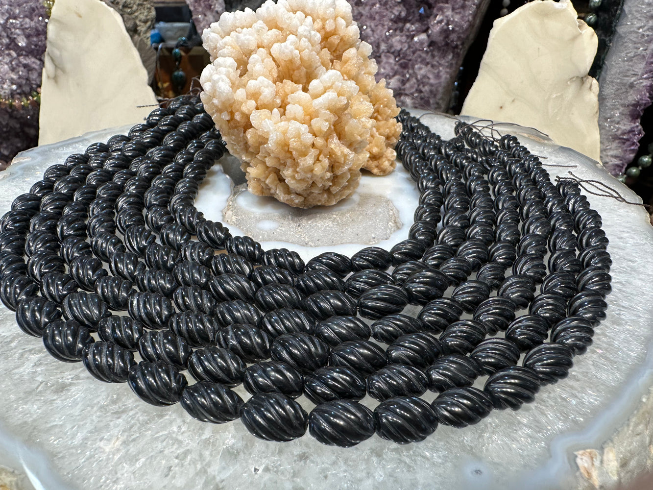 Black onyx oval carved twist 12mm gemstone beads